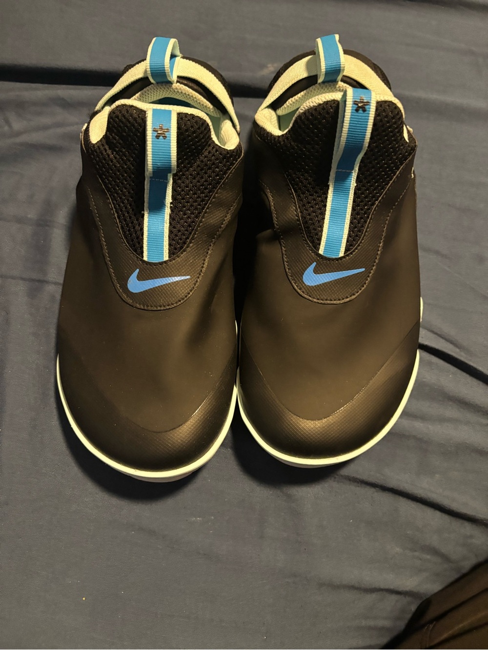Nike Men’s Slip-On Sneakers in Black and Light Blue
